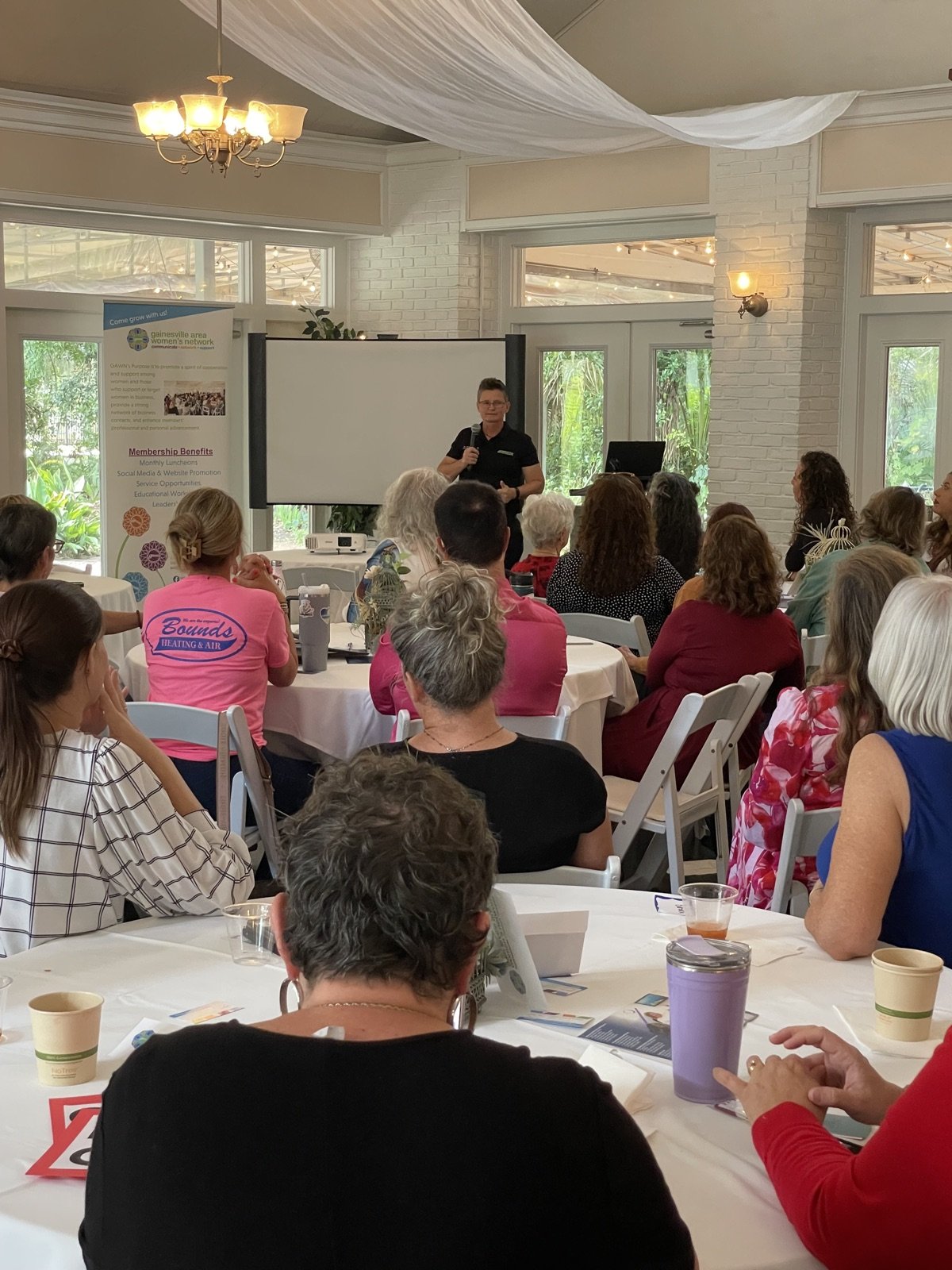 Dr. Laura McChesney presenting at a community event